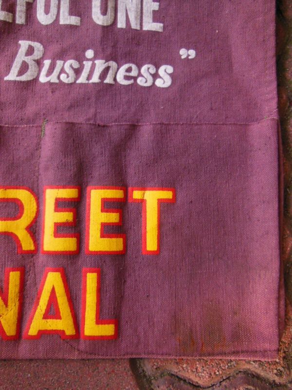 THE WALL STREET JOURNAL ADVERTISING BROWN DUCK APRON - ROCK-A-HULA